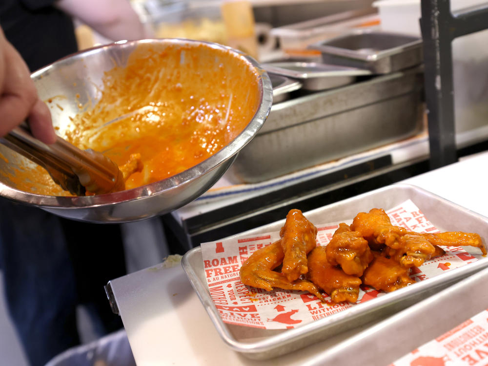 Chicken wing prices have fallen for the second year in a row, in a windfall for Super Bowl snackers. Beef prices, however, are still climbing.