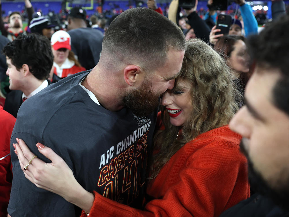 Travis Kelce and Taylor Swift celebrate after the Kansas City Chiefs win AFC Championship Game at M&T Bank Stadium in Baltimore on January 28.