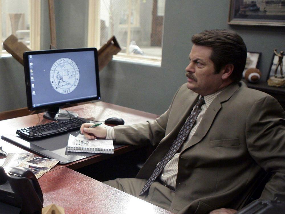 Amy Poehler and Nick Offerman in <em>Parks and Recreation</em>.