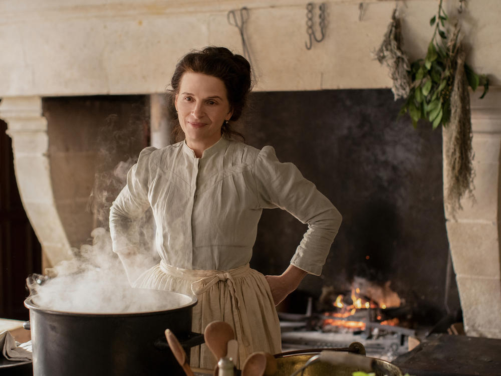 Juliette Binoche prepares one elaborate dish after another in <em>The Taste of Things.</em>