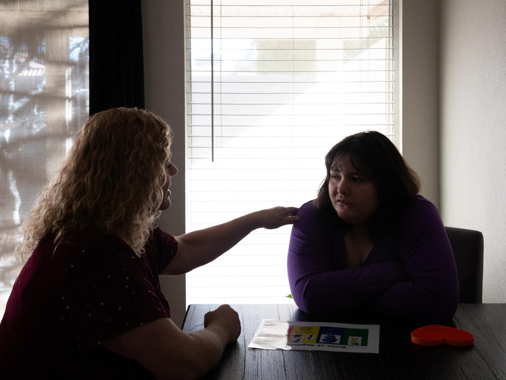 Melody and Angeleena O'Connor sit together at their home. Melody calls DAAY court 