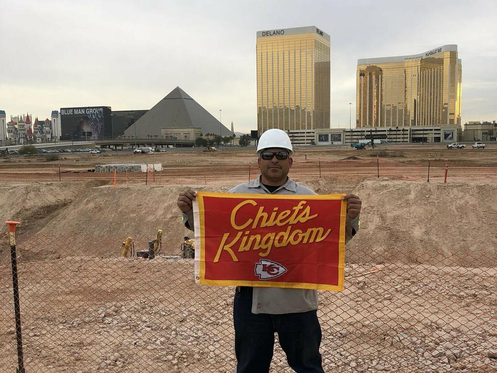 The photo from the fateful text showing Gerard DeCosta with the flag he said he buried under the field at Allegiant Stadium.
