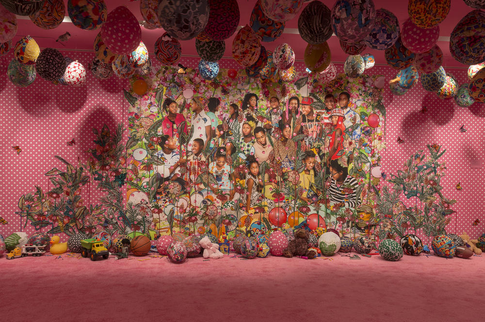 A large 2016 installation by Ebony G. Patterson called <em>... they were just hanging out... you know...talking about...(...when they grow up...)</em> made of beads, appliqués, fabric, glitter, buttons, costume jewelry, trimming, rhinestones, glue and digital prints.