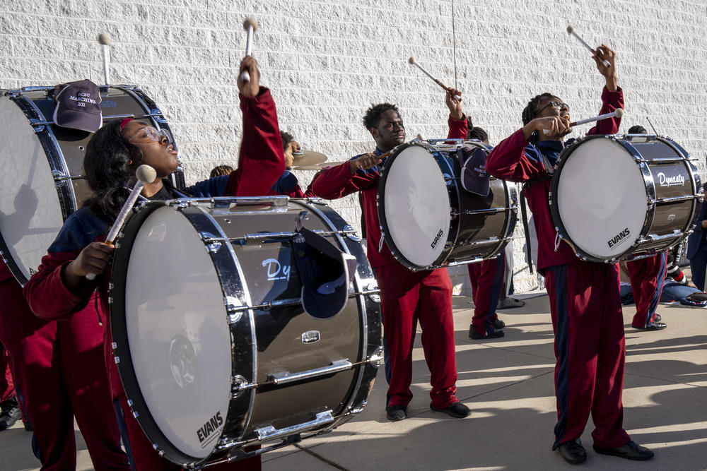 An SCSU drum line performs ahead of the vice president's campaign event on campus.