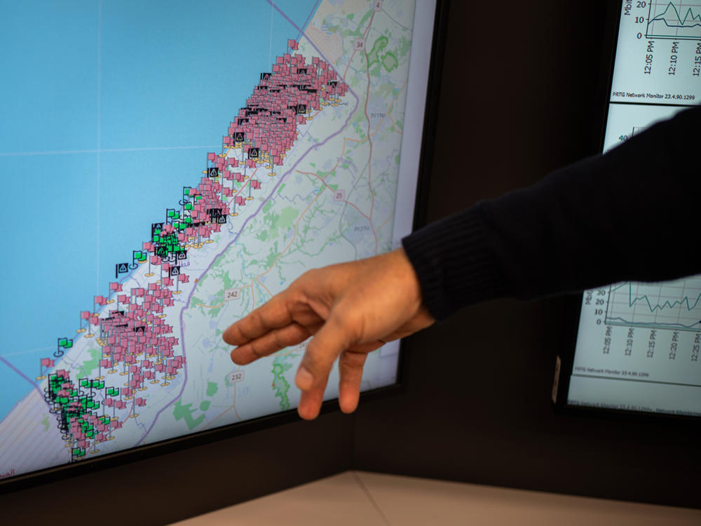 A map of Gaza in the Paltel headquarters shows areas where communications infrastructure has been destroyed or disabled.