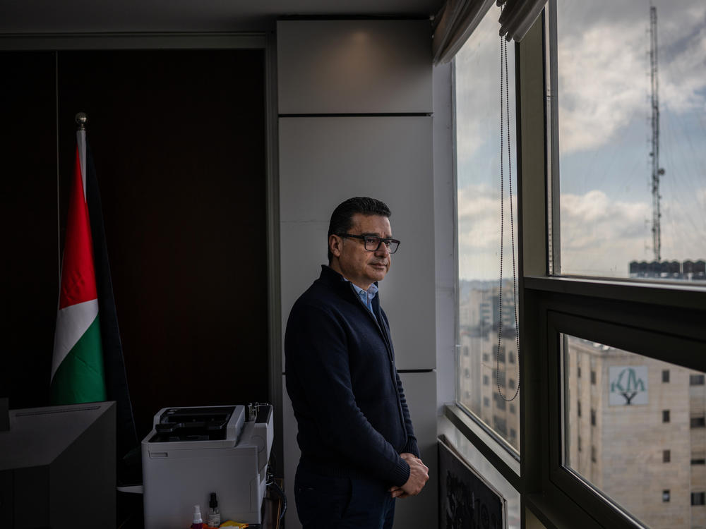 Mamoon Fares, corporate support director for Paltel, stands in his office in Ramallah. 