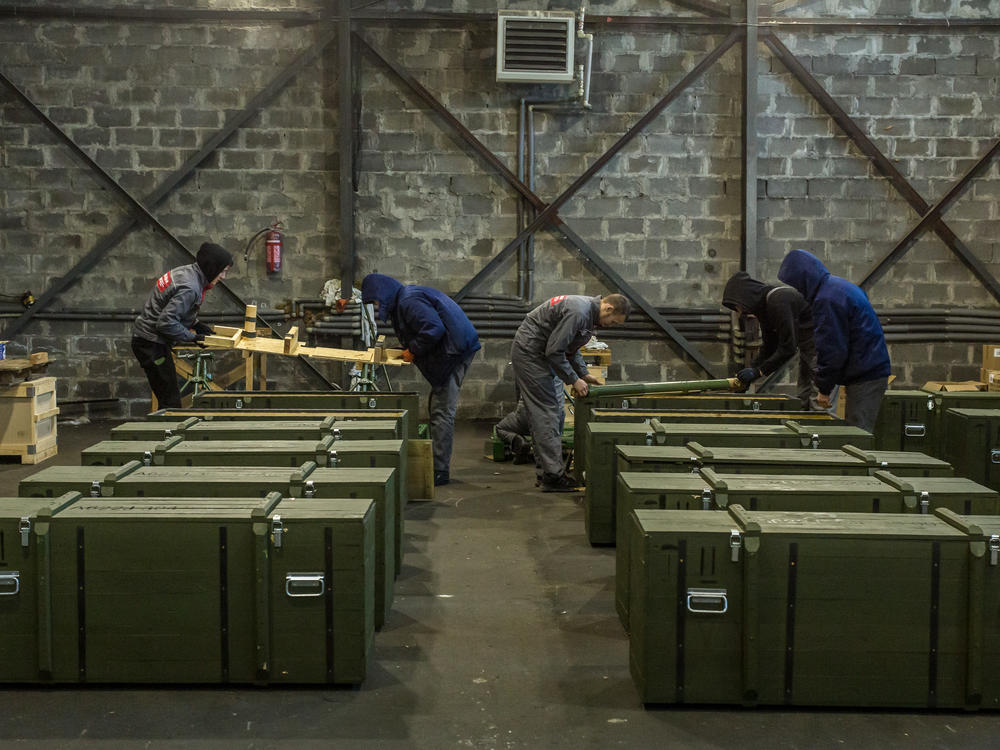 Workers crate mortar launchers in an assembly shop of the Ukrainian Armor Design and Manufacturing Co. Ukrainian Armor produces specialized armored vehicles as well as mortar launchers.