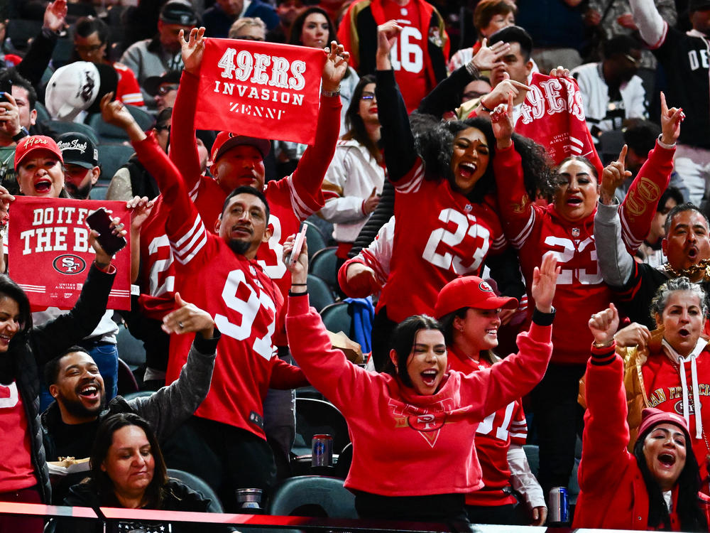San Francisco 49ers fans cheer during Super Bowl LVIII Opening Night at Allegiant Stadium in Las Vegas, Nevada on February 5, 2024.