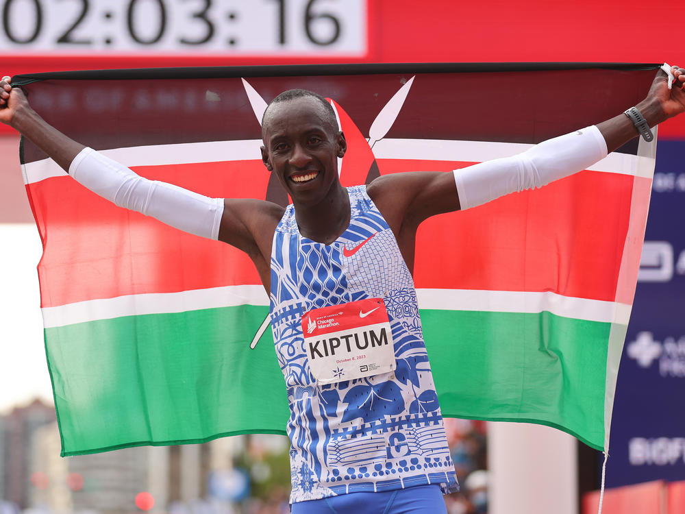 Kelvin Kiptum of Kenya celebrates after winning the 2023 Chicago Marathon professional men's division and setting a world record marathon time of 2:00:35 at Grant Park on Oct. 8, 2023, in Chicago.