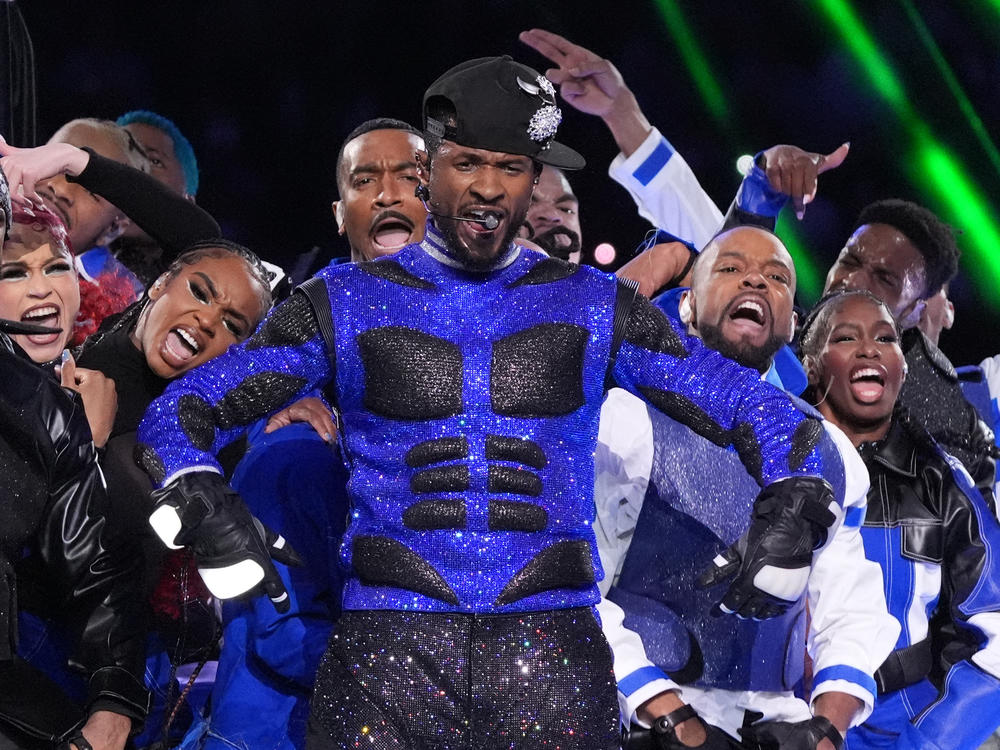 Usher performs during the Apple Music halftime show of Super Bowl LVIII in Las Vegas, Nevada.