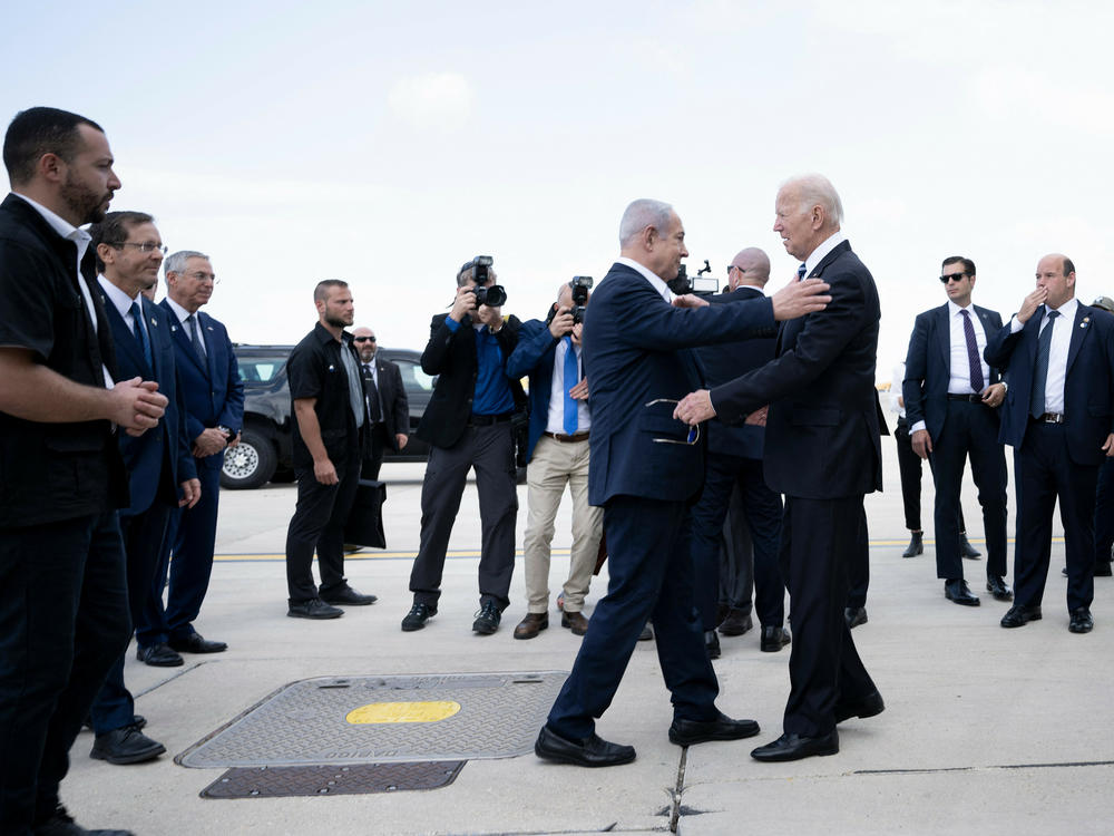 Israel Prime Minister Benjamin Netanyahu greets President Joe Biden upon his arrival in Israel shortly after Hamas' attack on Israel in October of last year.  Israel's conduct of the war with Hamas is testing the relationship between Biden and Netanyahu.