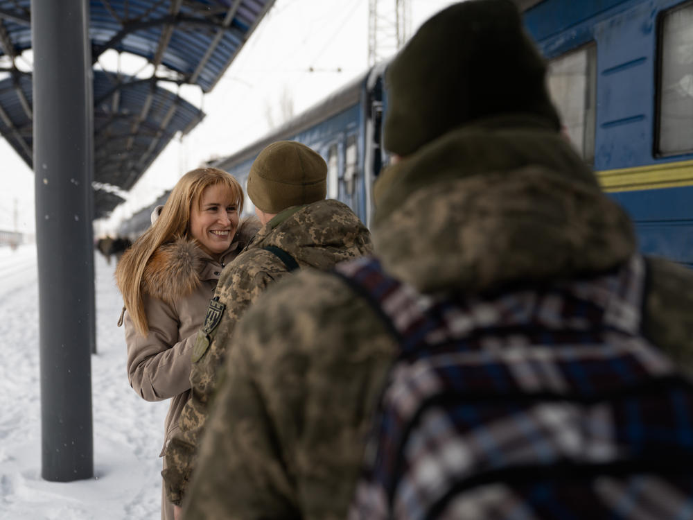 Inna Yermolovych meets her husband, Dima, at the train station in Sloviansk, in eastern Ukraine. They will spend a few days together before he returns to the battlefield.