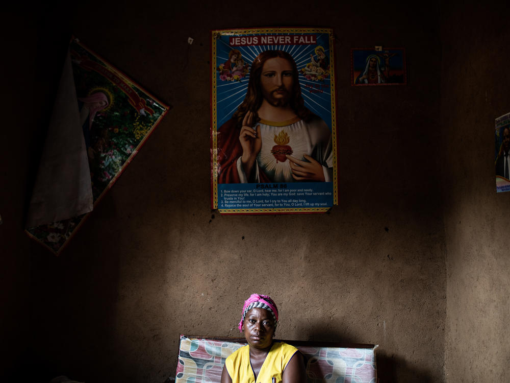 Janine Kibwana, Ebola survivor and mother of five, sits in her living room in Beni, Democratic Republic of the Congo. Researchers studying the DRC's most recent Ebola outbreak say that a new vaccine can dramatically reduce the risk of dying from the disease.