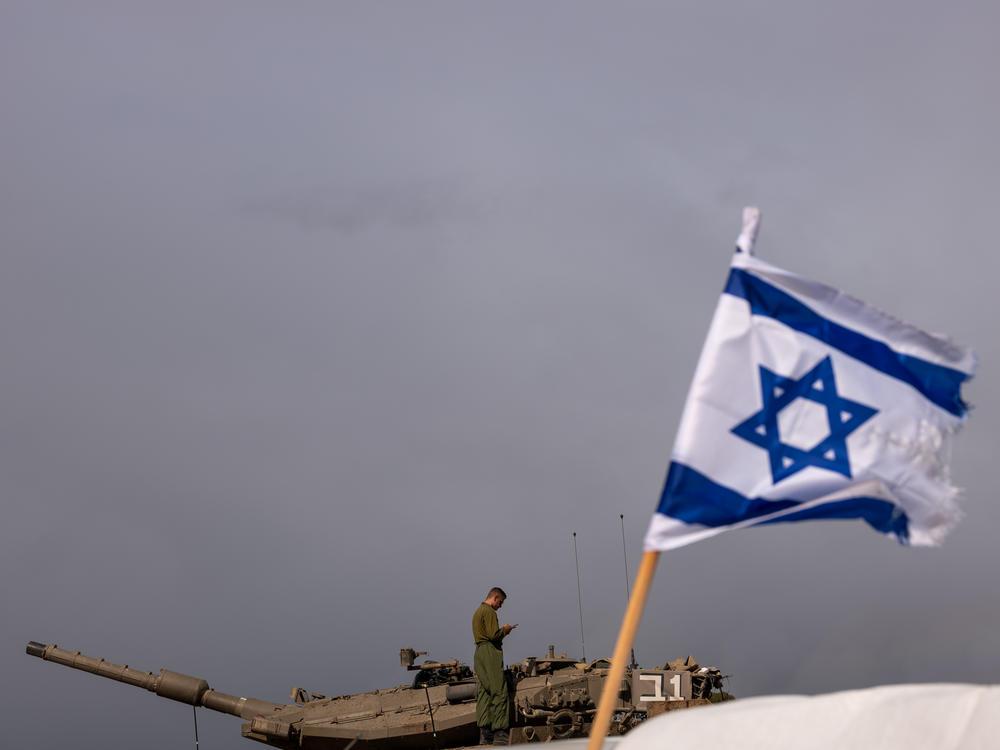 Members of the Israeli military work at a staging area near the border of Gaza during a cease-fire between Israel and Hamas in November.