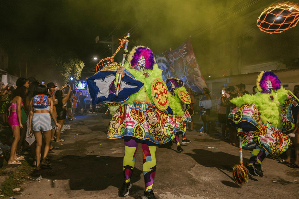 The all-women bate-bola crew Brilhetes makes their first Carnival outing this year in Rio de Janeiro's Anchieta neighborhood on Feb. 9.
