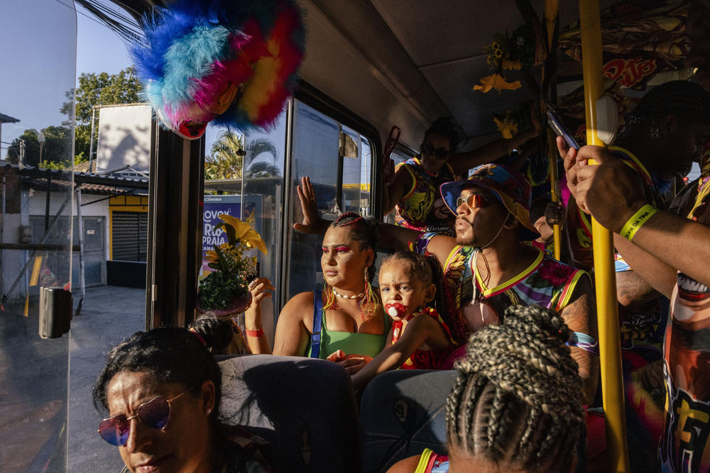 Members of the Bem Feito bate-bola crew travel by bus to several of Rio de Janeiro's west-side neighborhoods for the group's third day of Carnival outings.