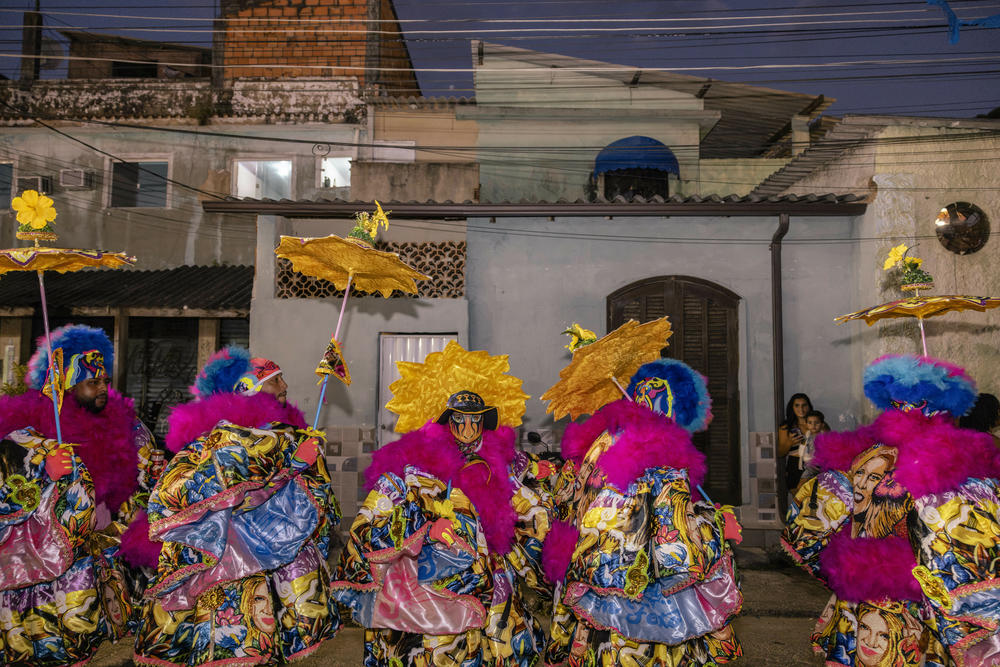 Bate-bola crew Bem Feito goes out during Carnival celebrations in Pedra de Guaratiba, a neighborhood in Rio de Janeiro, on Feb. 11.