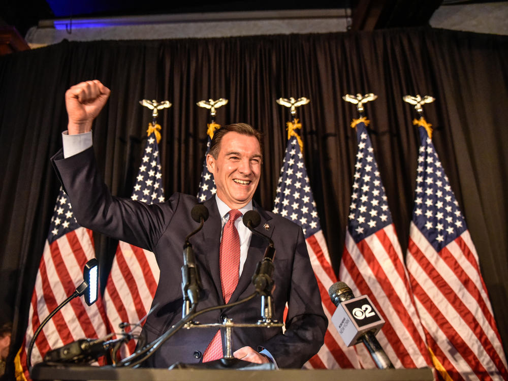 Democratic U.S. House candidate Tom Suozzi celebrates his victory in the special election to replace Republican Rep. George Santos on Tuesday night. Suozzi defeated Republican Mazi Pilip in large part because he was willing to take issues like immigration head on.