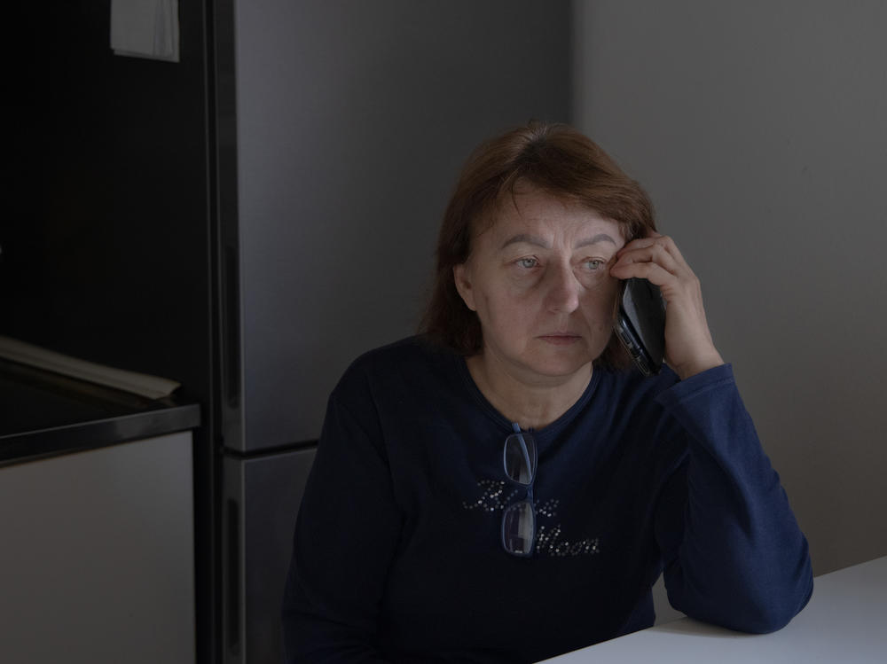 Maria Oleksiivna Fedoryshyn is on the phone with her family in Ukraine on a morning after intense overnight shelling while she lives in Bologna, Italy, in October 2022. Maria's son is a soldier who has been fighting at the front since the first days of the invasion. Maria wakes up in the morning immediately checking her phone to ensure that her son is still alive.