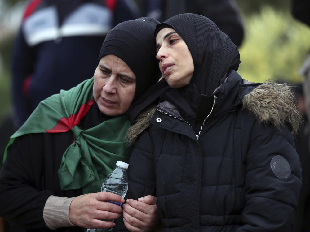 Women mourn during the funeral procession of the victims who were killed in an Israeli strike in Qantara village, south Lebanon, on Thursday.