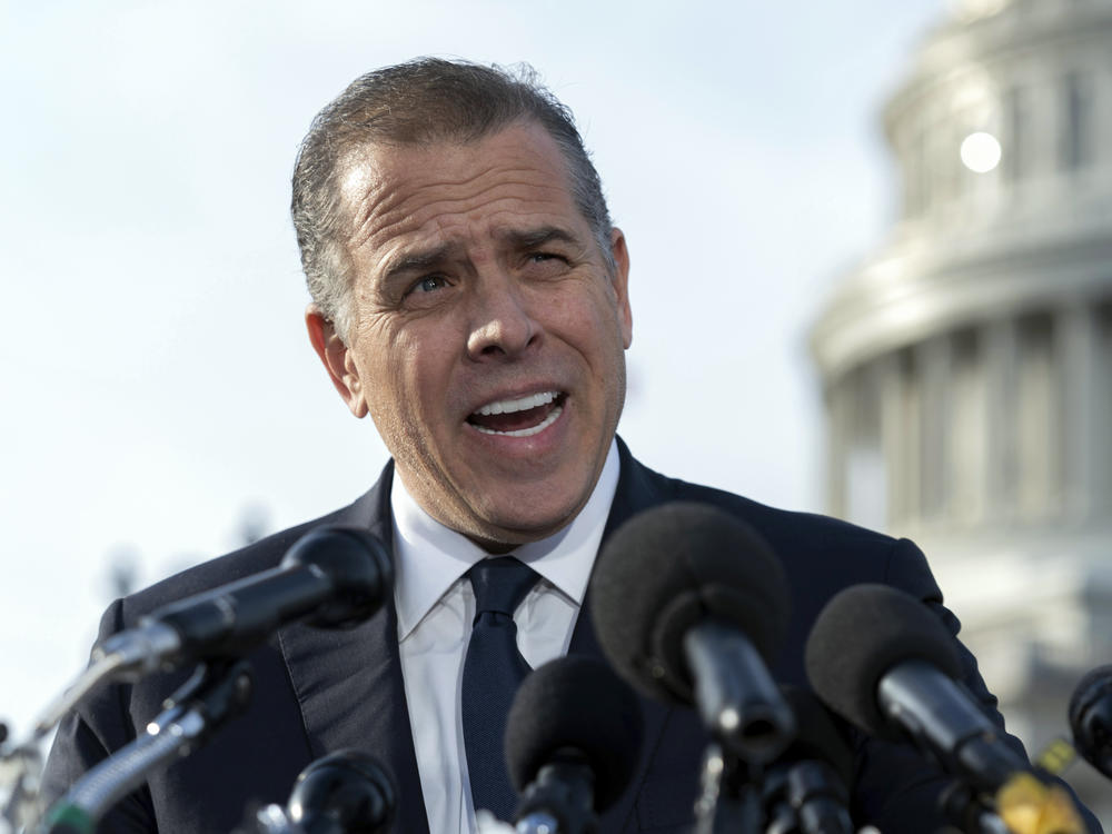 Hunter Biden, son of President Biden, talks to reporters at the U.S. Capitol, in Washington, on Dec. 13, 2023. An FBI informant has been charged with lying to his handler about ties between Joe Biden and Hunter Biden and a Ukrainian energy company.
