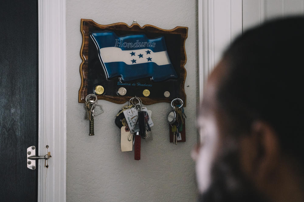 Edmund Garcia's keys hang on a Honduran Flag key holder.