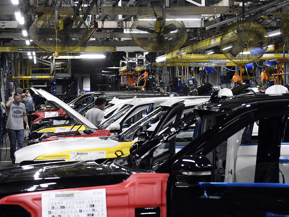 In this file photo, workers assemble Ford trucks at the Ford Kentucky Truck Plant on Oct. 27, 2017, in Louisville, Ky.