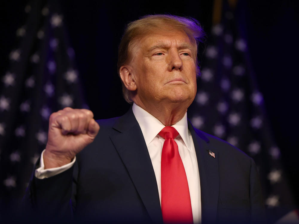 Former President Donald Trump greets supporters at his caucus night watch party at the Treasure Island Hotel & Casino on Feb. 8 in Las Vegas.