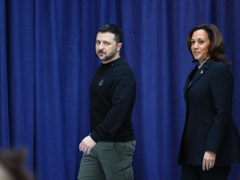 Ukrainian President Volodymyr Zelenskyy and Vice President Harris arrive at a press conference at the Munich Security Conference on Saturday.
