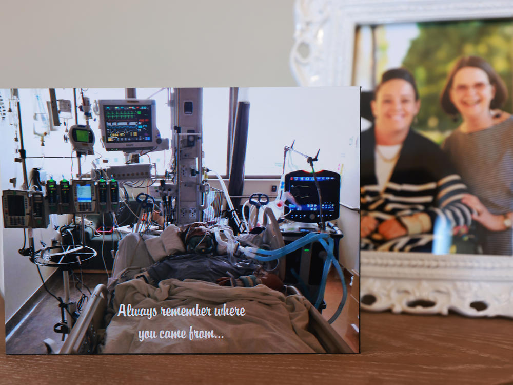 In her home office, VanSickle keeps an image of herself in the hospital after her 2014 car accident. With her law degree, VanSickle wants to become a disability rights lawyer.