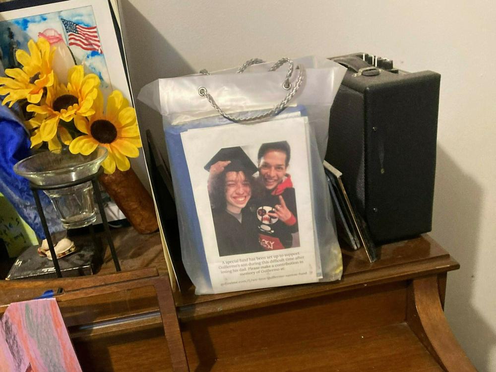 The graduation photo adorns containers holding the ashes of Guillermo Jose Santos, one of more than 100,000 Americans who died of drug overdoses in 2021. That number was more than 111,000 in 2023.