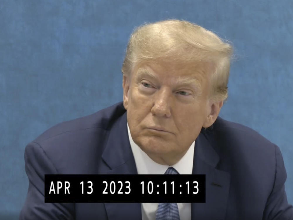 In this image taken from video, Donald Trump sits for a deposition on April 13, 2023, where the former president came face-to-face with New York Attorney General Letitia James.
