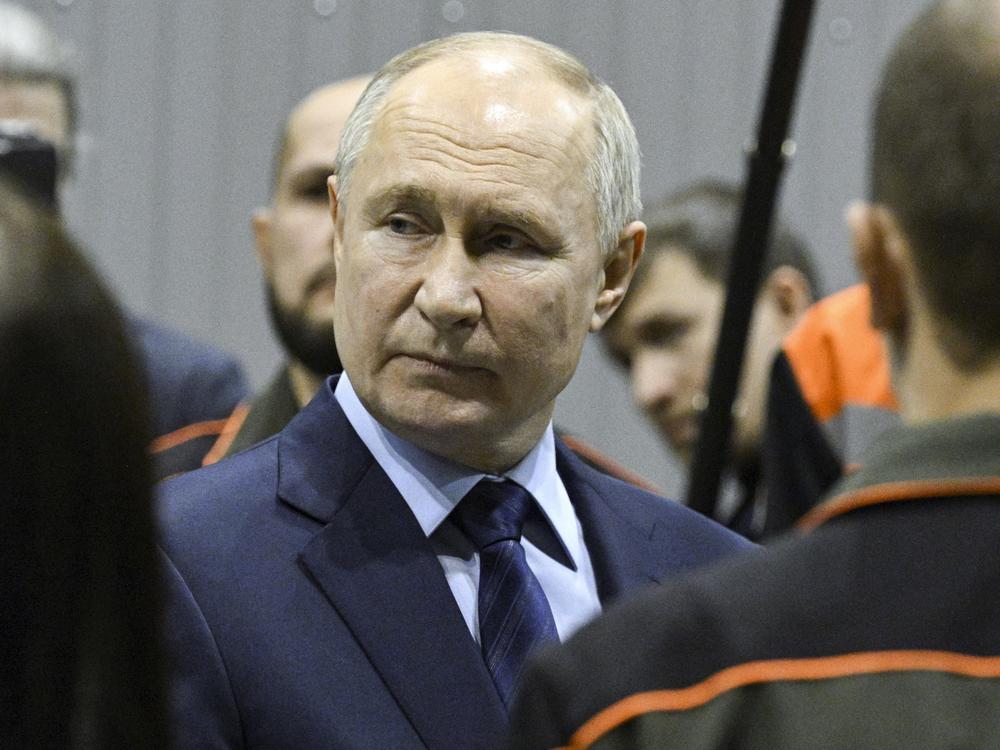 Russian President Vladimir Putin visits a factory on Thursday.