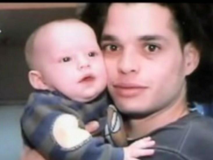 The author as a baby held by his dad. Guillermo Jose Santos was 26 when his son was born.