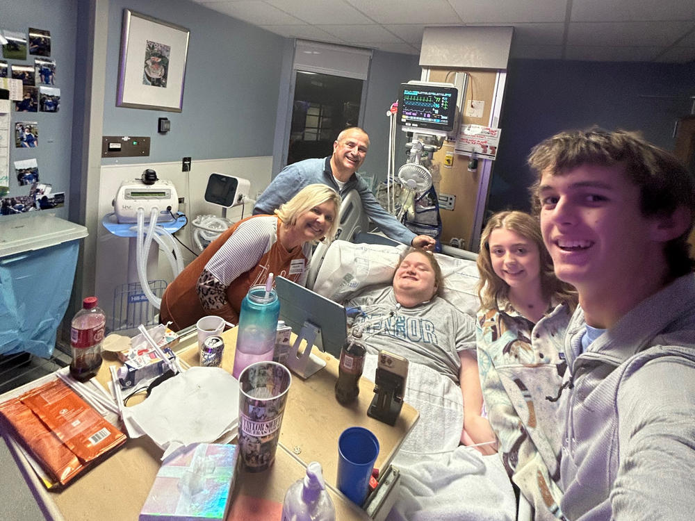 Alexis Ratcliff is surrounded by her Aunt Susan Ratcliff, Uncle Rondale Ratcliff and cousins Halee and Caden Ratcliff in her hospital room.