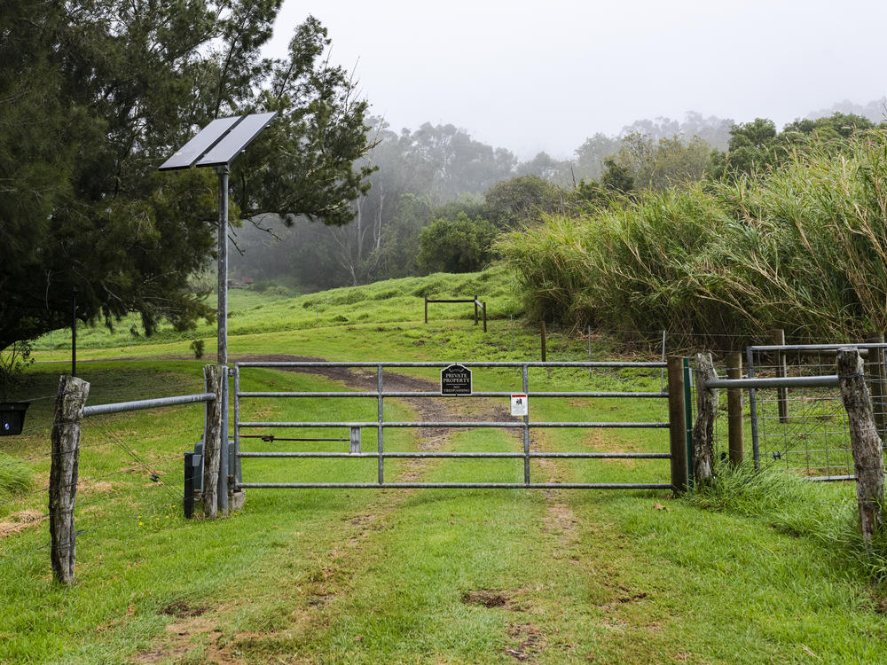The gate to a large property in Waimea. Median home prices in the area are up 87% from pre-pandemic prices.