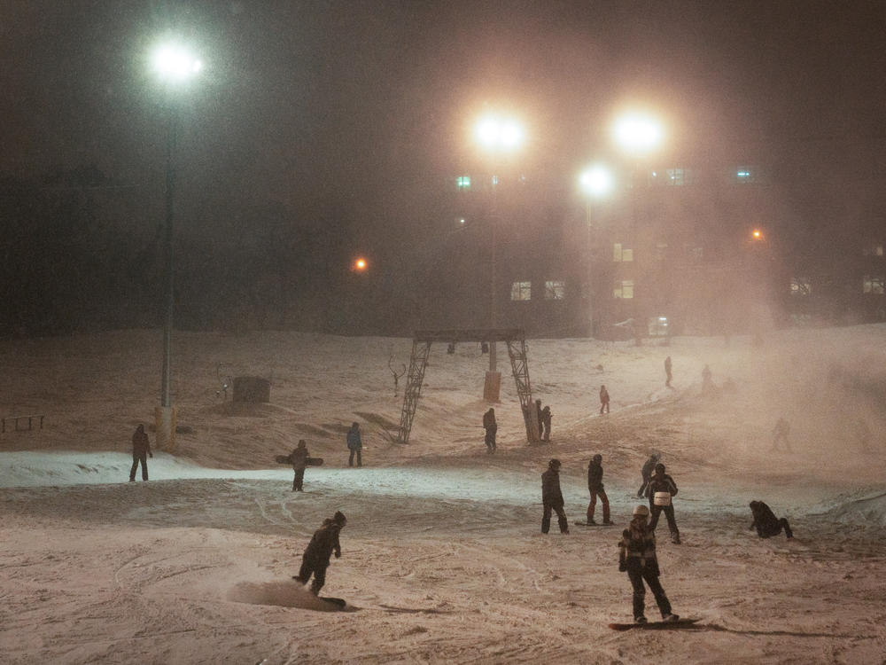 Ukrainians hit the ski slopes at a recreational ski area in Kyiv on Jan. 3.
