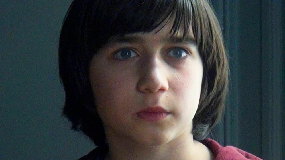 Eleven-year-old Daniel didn't witness his father's death yet his arrival brings clarity — if not order — to the courtroom.