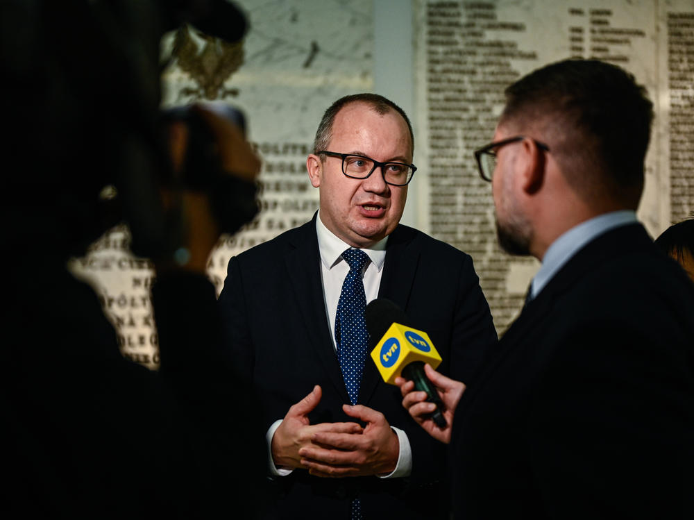 Poland's then soon-to-be minister of justice, Adam Bodnar, walks through the halls of parliament ahead of the vote of confidence on Donald Tusk's Cabinet during a session of parliament on Dec. 12, in Warsaw.