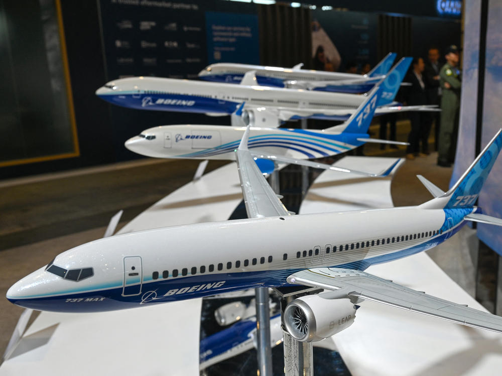 Boeing announced a management shakeup - including the ouster of the leader of the 737 Max production line. At the Singapore Airshow, miniature models of Boeing aircraft including the 737 Max (front) are displayed on February 21, 2024.