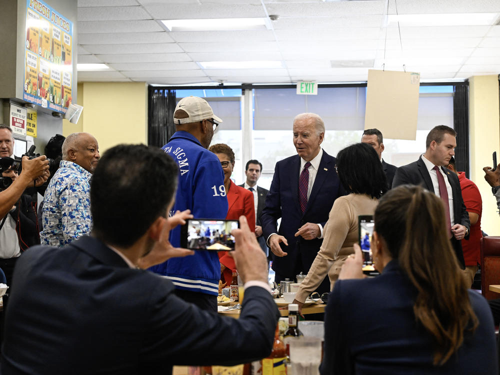 President Biden greets people at CJ's Cafe in Los Angeles, Calif., on Feb. 21, 2024.
