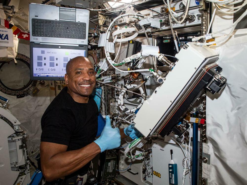 NASA astronaut and Expedition 64 Flight Engineer Victor Glover is pictured inside Japan's Kibo laboratory module installing research gear to develop a biological model to study the effects of spaceflight on musculoskeletal disease.