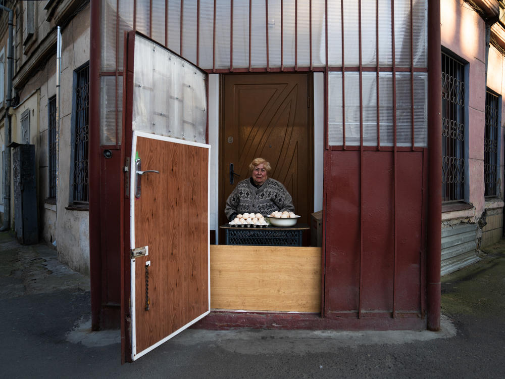 A woman sells eggs in Odesa's Moldovanka neighborhood, the center of the city's Jewish community, in May.