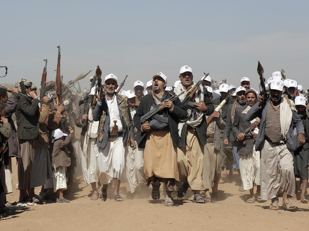 Houthi fighters march during a rally of support for Palestinians in the Gaza Strip and against the U.S. strikes on Yemen, outside Sanaa, on Jan. 22.