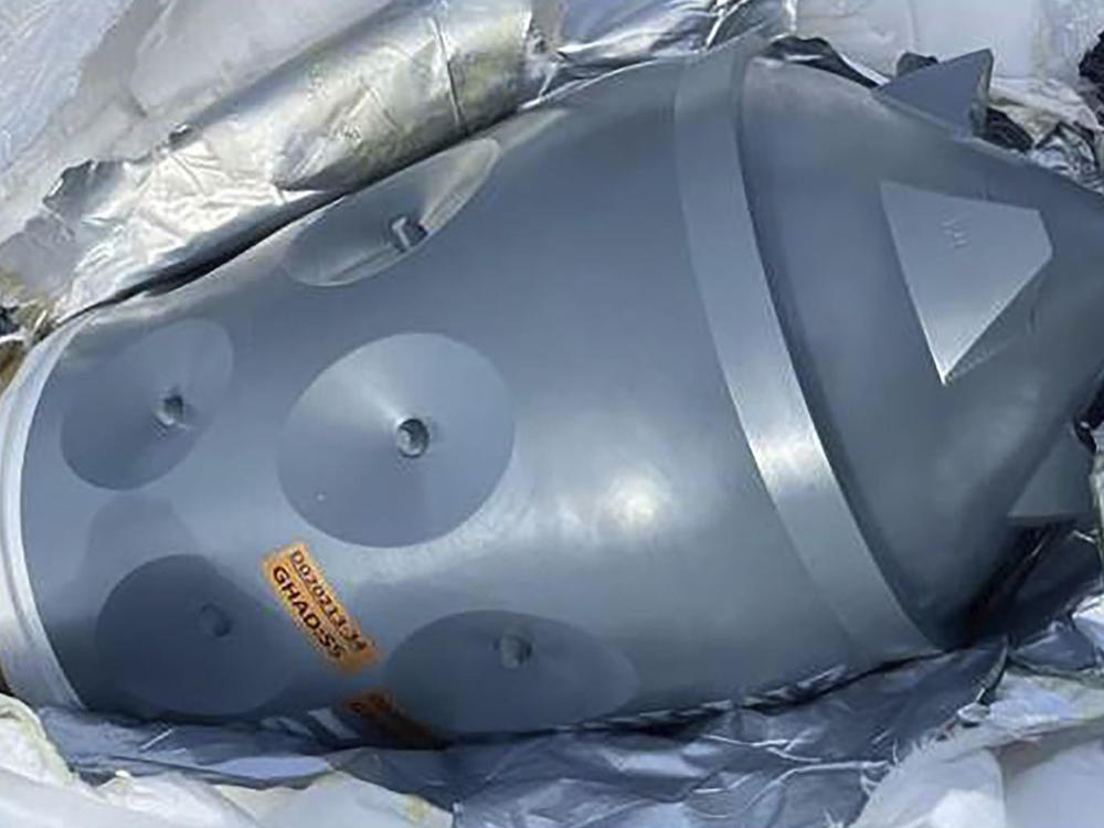 This image released by the U.S. Department of Justice in an FBI affidavit filed in U.S. District Court, Alexandria, Va., shows what is described as Iranian-made warhead bound for Yemen's Houthi seized off a vessel in the Arabian Sea. Four foreign nationals were charged Thursday, Feb. 22, 2024, with transporting suspected Iranian-made weapons on a vessel intercepted by U.S. naval forces.
