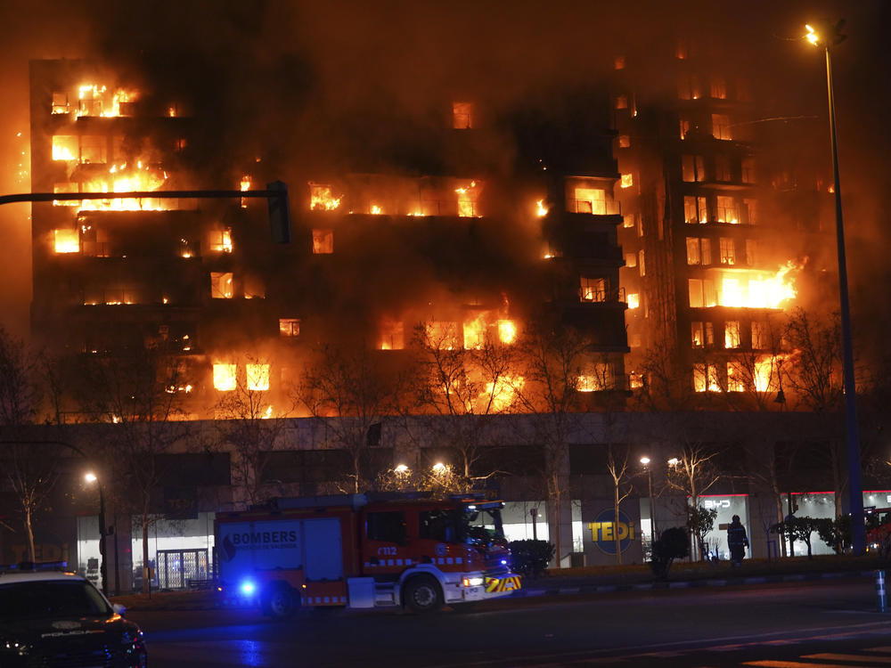 A housing block burns in Valencia, Spain, on Thursday.