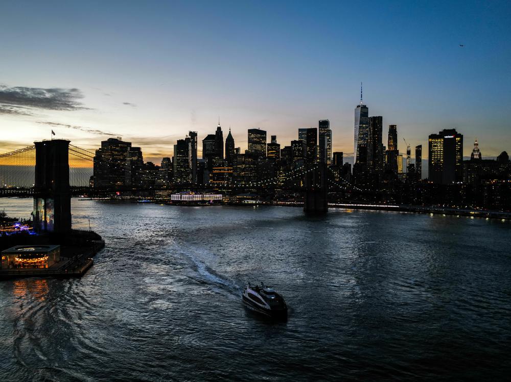 An outpost of The Second City has opened in Brooklyn. Above, the Brooklyn Bridge and lower Manhattan skyline are pictured at sunset.
