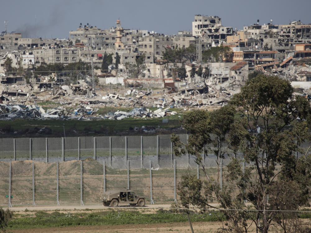 An Israeli army vehicle moves along the border with Gaza in southern Israel on Feb. 1.