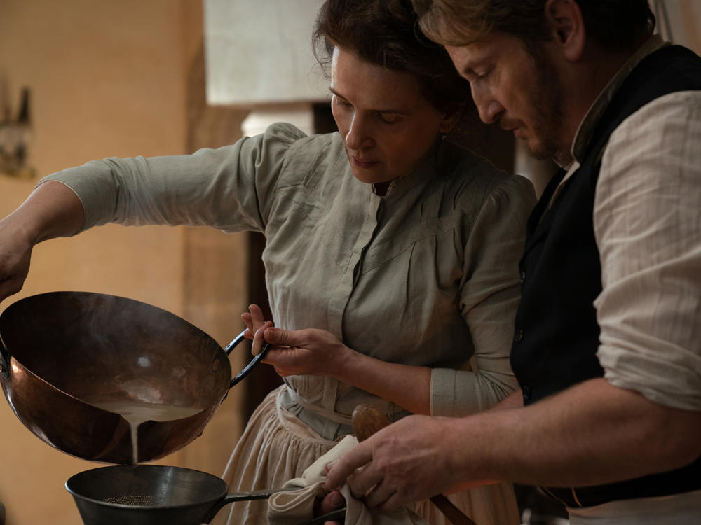 Eugénie (Juliette Binoche) and Dodin Bouffant (Benoît Magimel) in <em>The Taste of Things</em>.