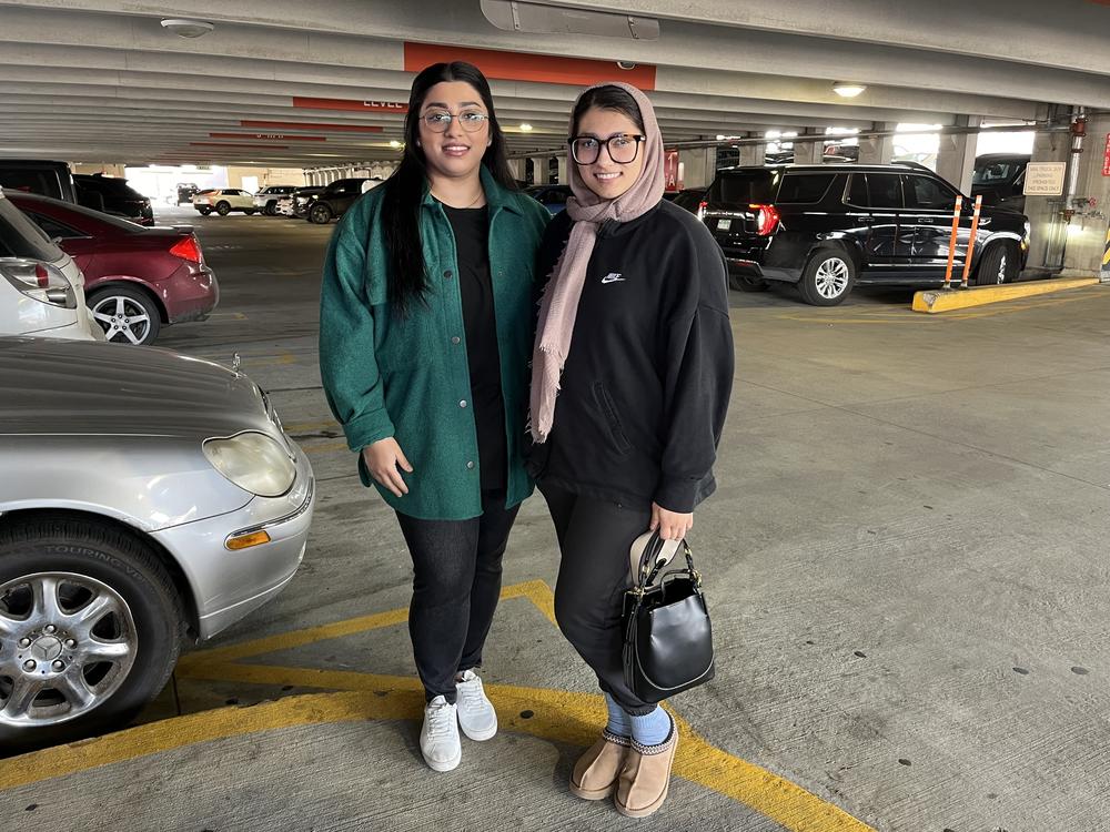 Anem Khan and Huma Shahzad, pictured in a parking garage in Dearborn on Friday, say they will be voting uncommitted in Tuesday's primary.